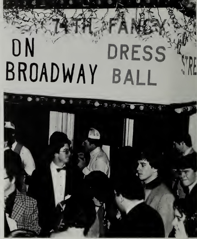 Pictured is students standing under the 74th Annual Fancy Dress sign, printed black and white in the Calyx 1981. The theme for this year was "on Broadway."