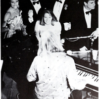 The image shows a small group of students dancing around a keyboard at Fancy Dress 1983, printed in the Calyx 1983.